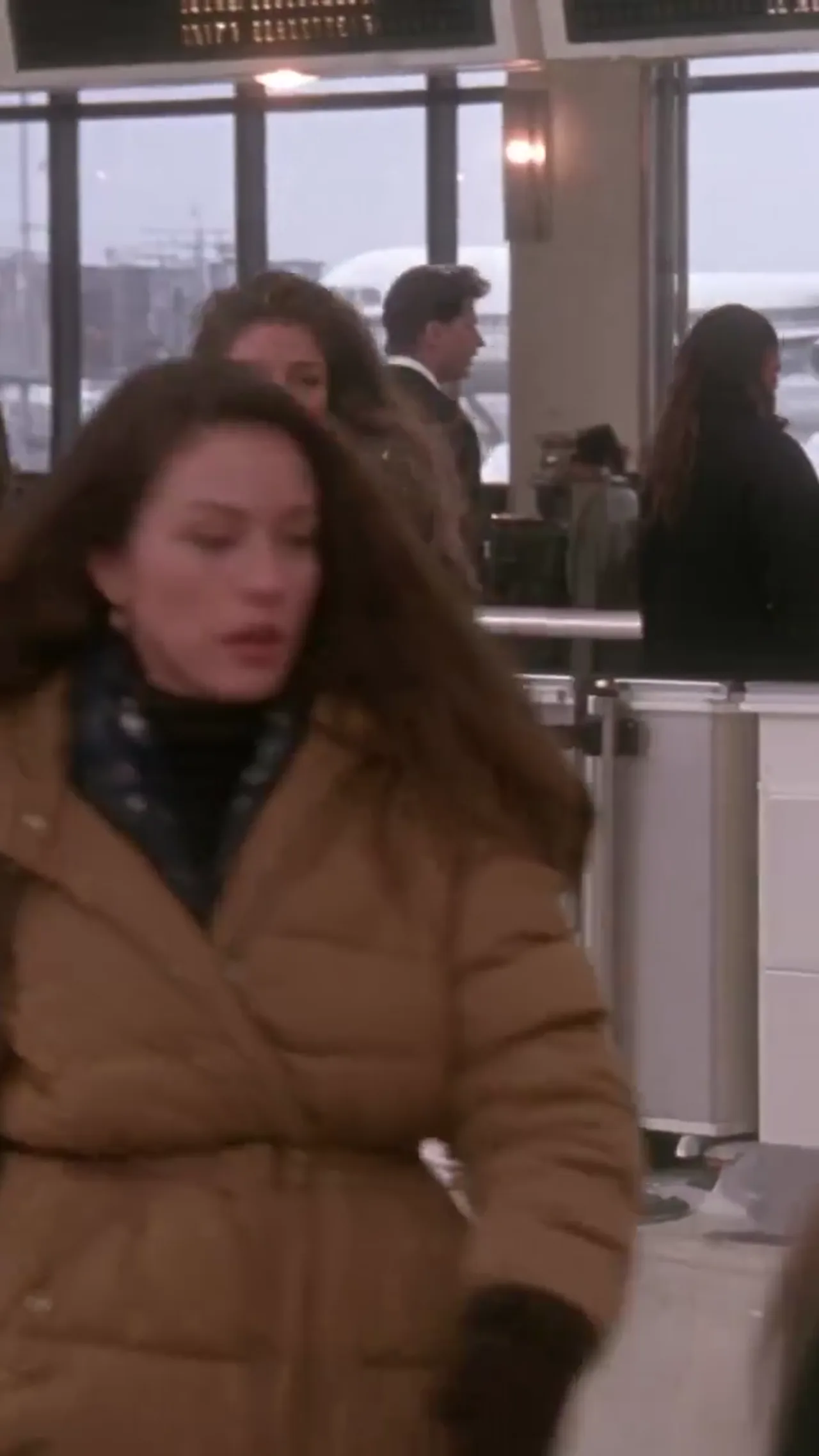 Woman Boards Airplane Beside Man